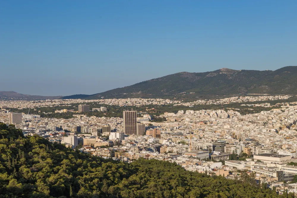 Central Athens from above — typical drop-off area for an Athens airport transfer by station wagon