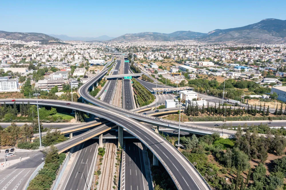 Aerial view of the Attiki Odos motorway — the route taken on every Athens airport transfer from Eleftherios Venizelos