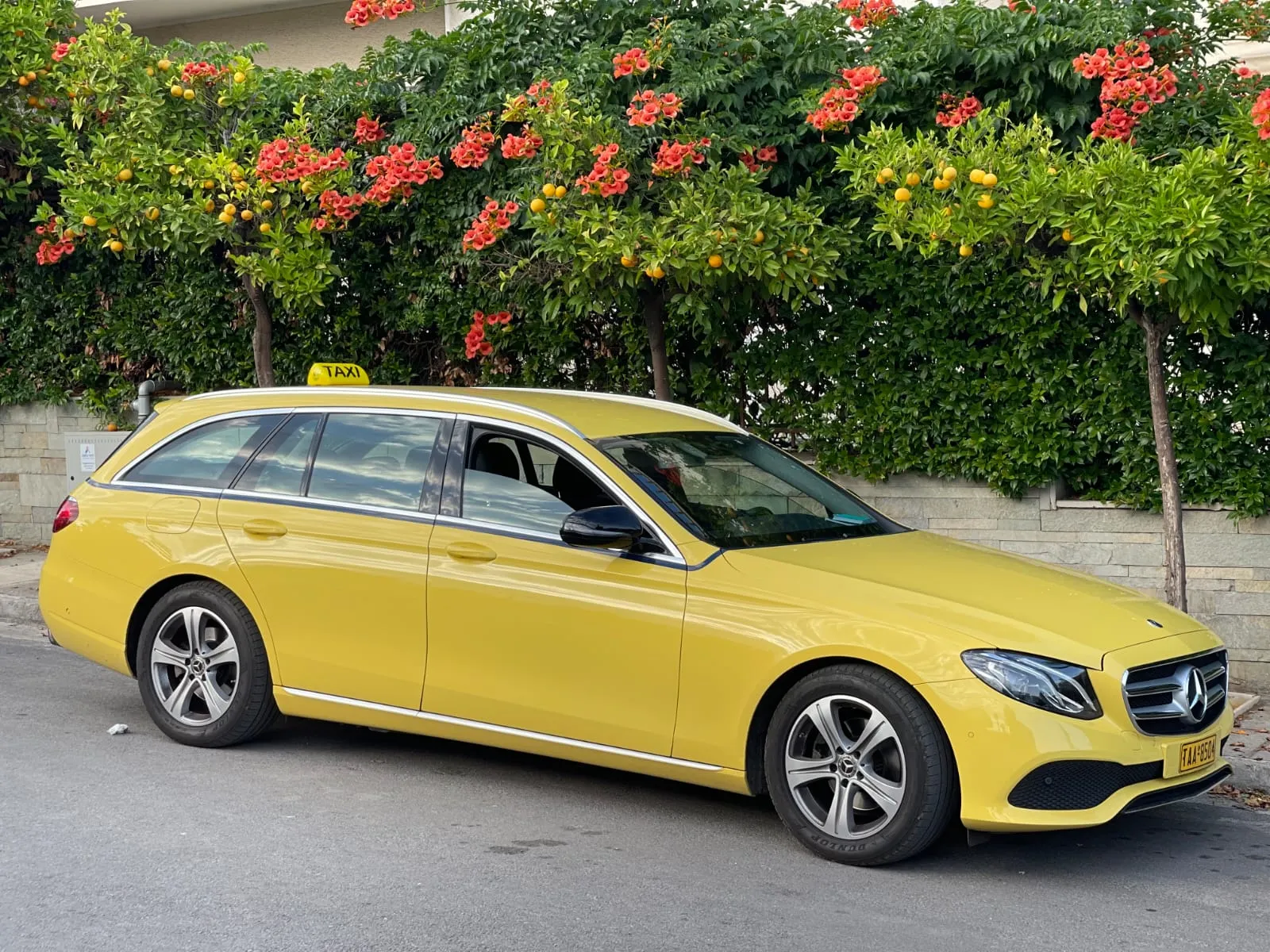 George's yellow Mercedes station wagon taxi in Athens