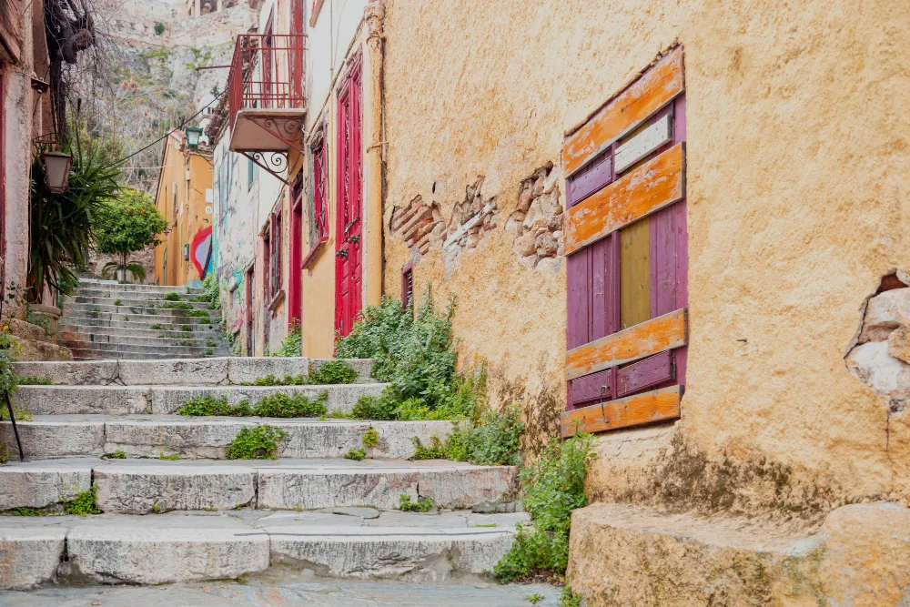 Stone-paved street in Plaka — featured on the half-day Athens city tour by station wagon